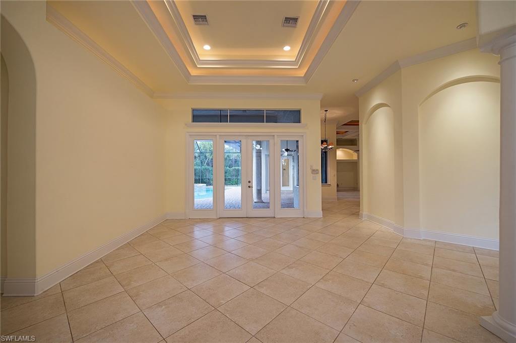 3883 North Road Naples, FL 34104 - Photo 3 of 20 a view of an empty room and window