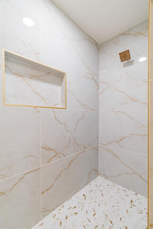 306 Sunset Street Roxton, TX 75477 - Photo 11 of 26 a bathroom with a shower