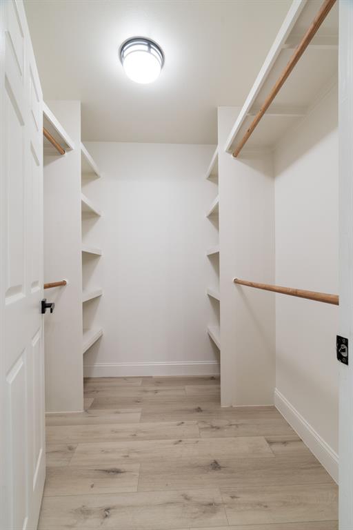 306 Sunset Street Roxton, TX 75477 - Photo 12 of 26 a view of an empty walk in closet