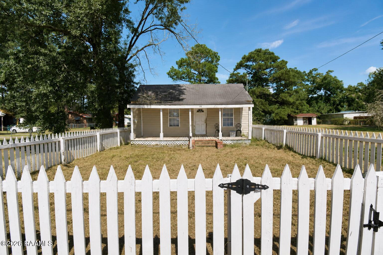 156 Oak Road Church Point, LA 70525 - Photo 10 of 17 Brightened cottage with porch and picket