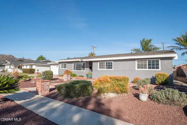 a front view of a house with a porch