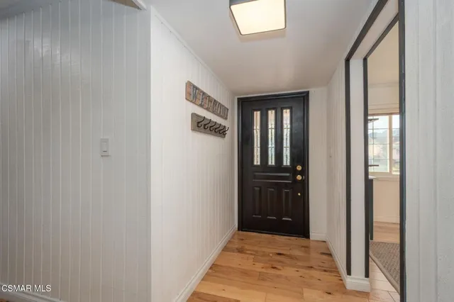 a view of hallway with front door