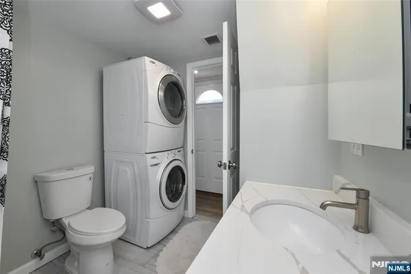 a bathroom with a sink and a toilet