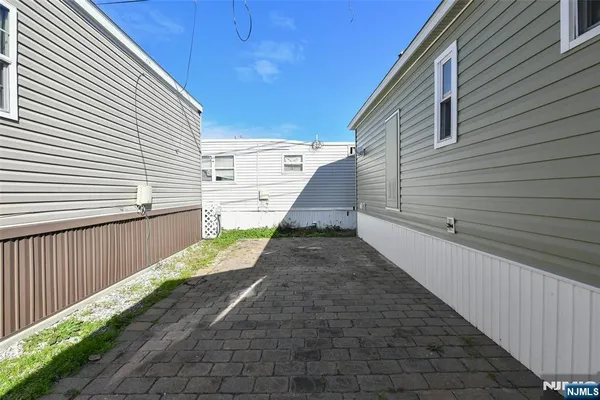 a view of a back yard of the house