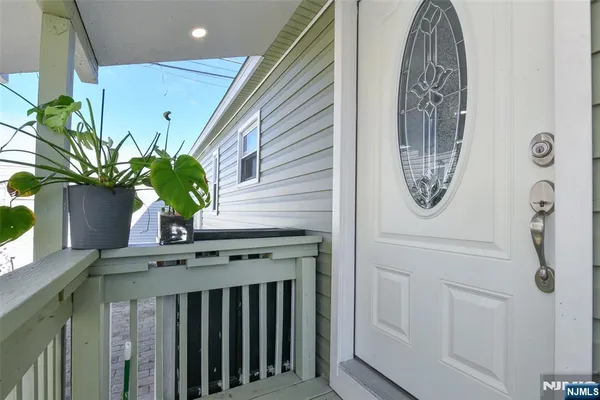 a view of a pathway with a patio