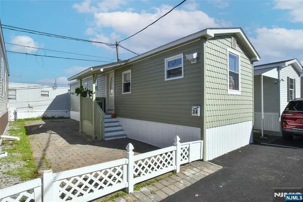 a car parked in front of a house