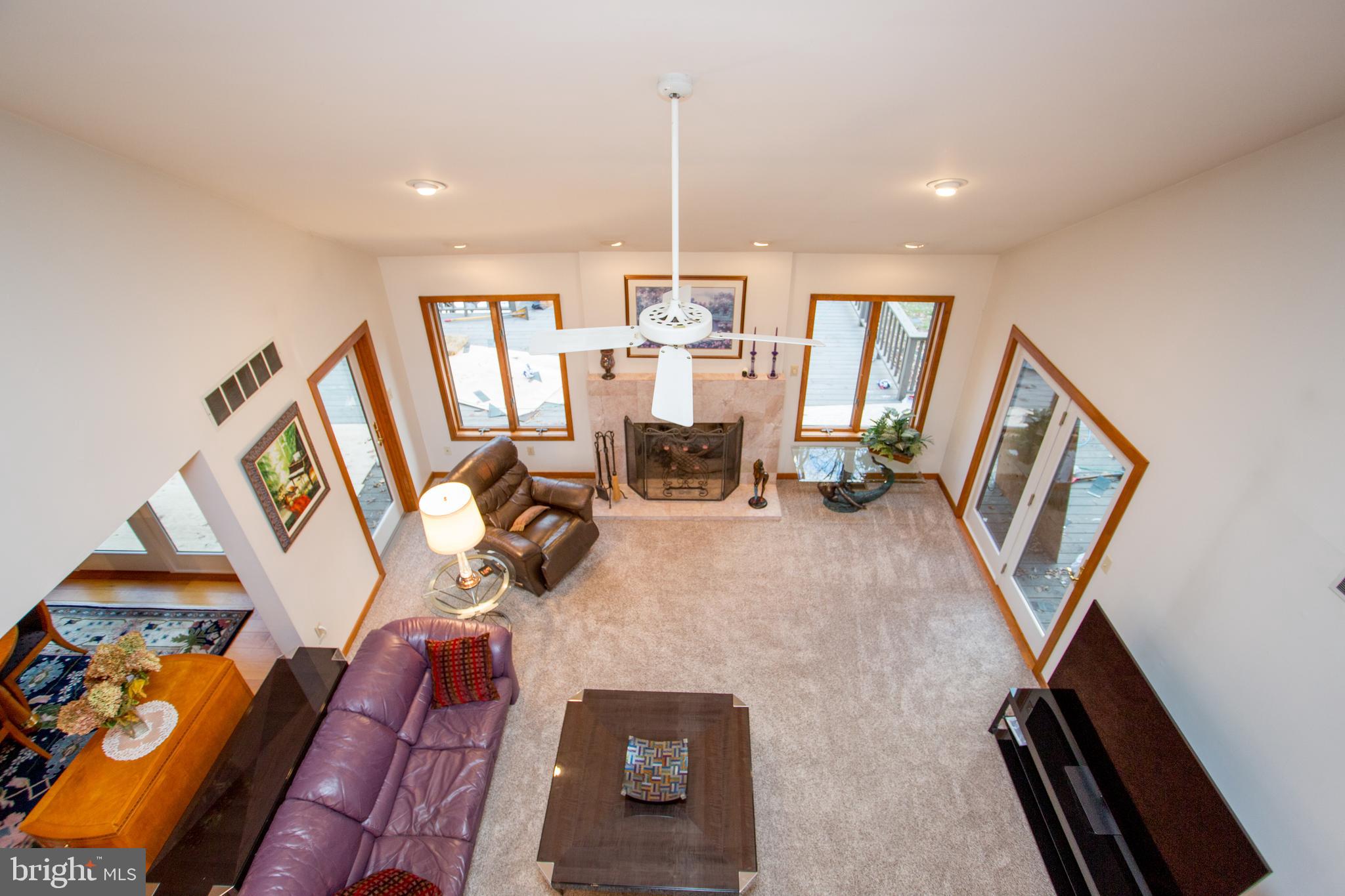 786 Ridge Road Telford, PA 18969 - Photo 19 of 105 a view of a livingroom with furniture hardwood floor and workspace