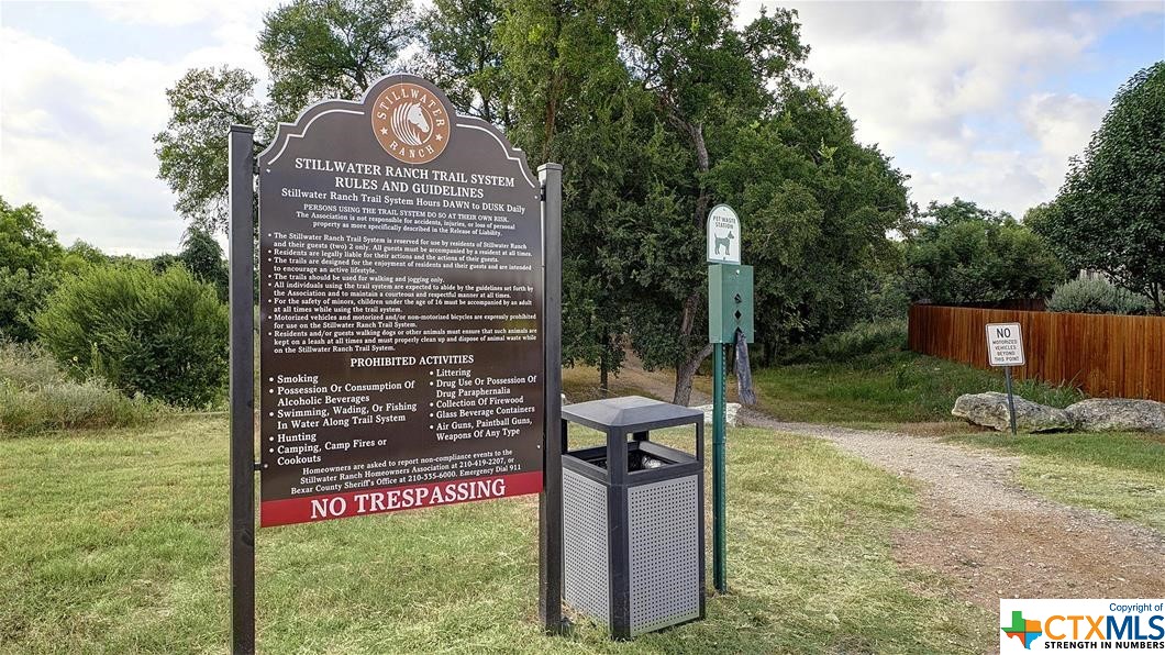 9618 Luke Path Helotes, TX 78023 - Photo 12 of 18 a view of a park with welcome board