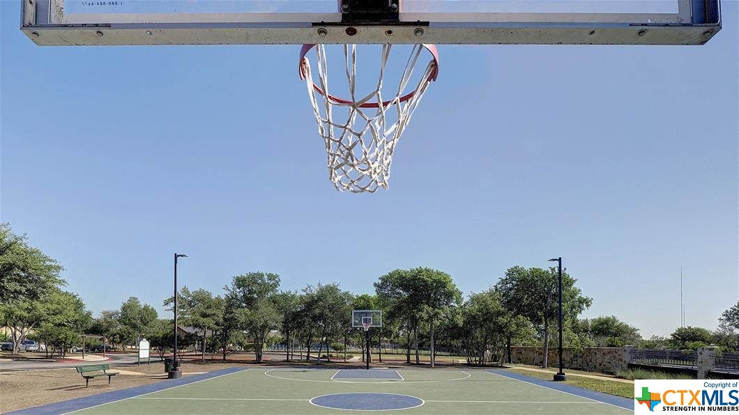 9618 Luke Path Helotes, TX 78023 - Photo 15 of 18 a view of a basketball court