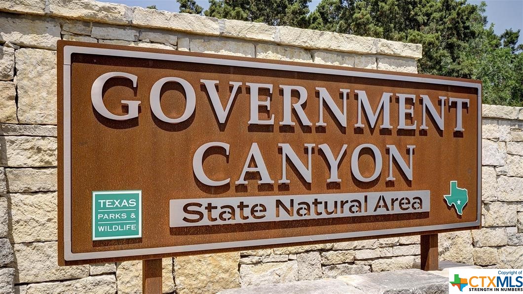 9618 Luke Path Helotes, TX 78023 - Photo 5 of 18 a close up of a street sign