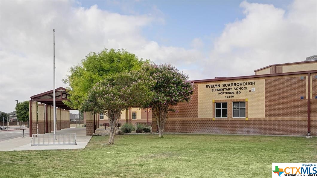 9618 Luke Path Helotes, TX 78023 - Photo 9 of 18 a view of a house with a yard