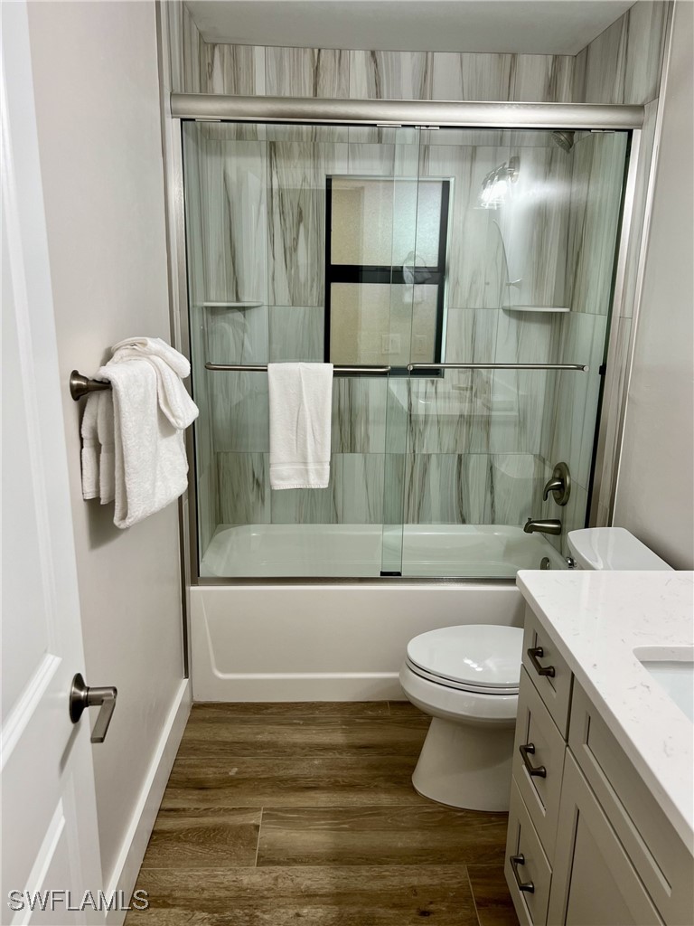 5117 Sea Bell Road, Unit F104 Sanibel, FL 33957 - Photo 21 of 41 a bathroom with a sink a toilet and shower