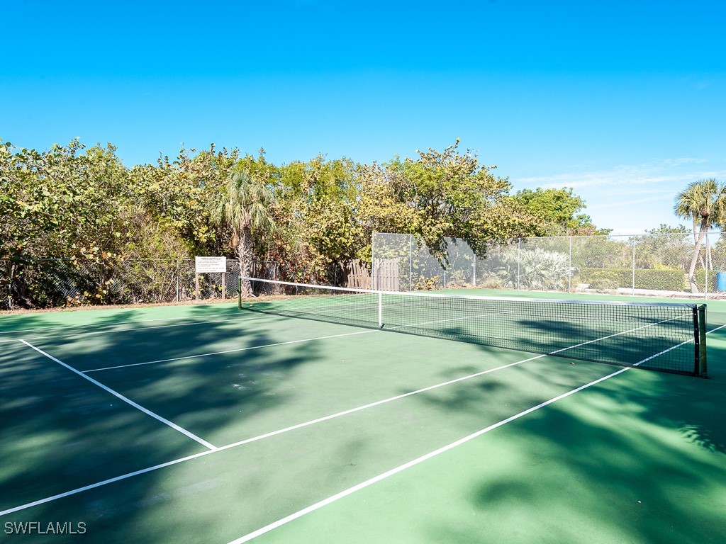 5117 Sea Bell Road, Unit F104 Sanibel, FL 33957 - Photo 29 of 41 a view of a tennis court