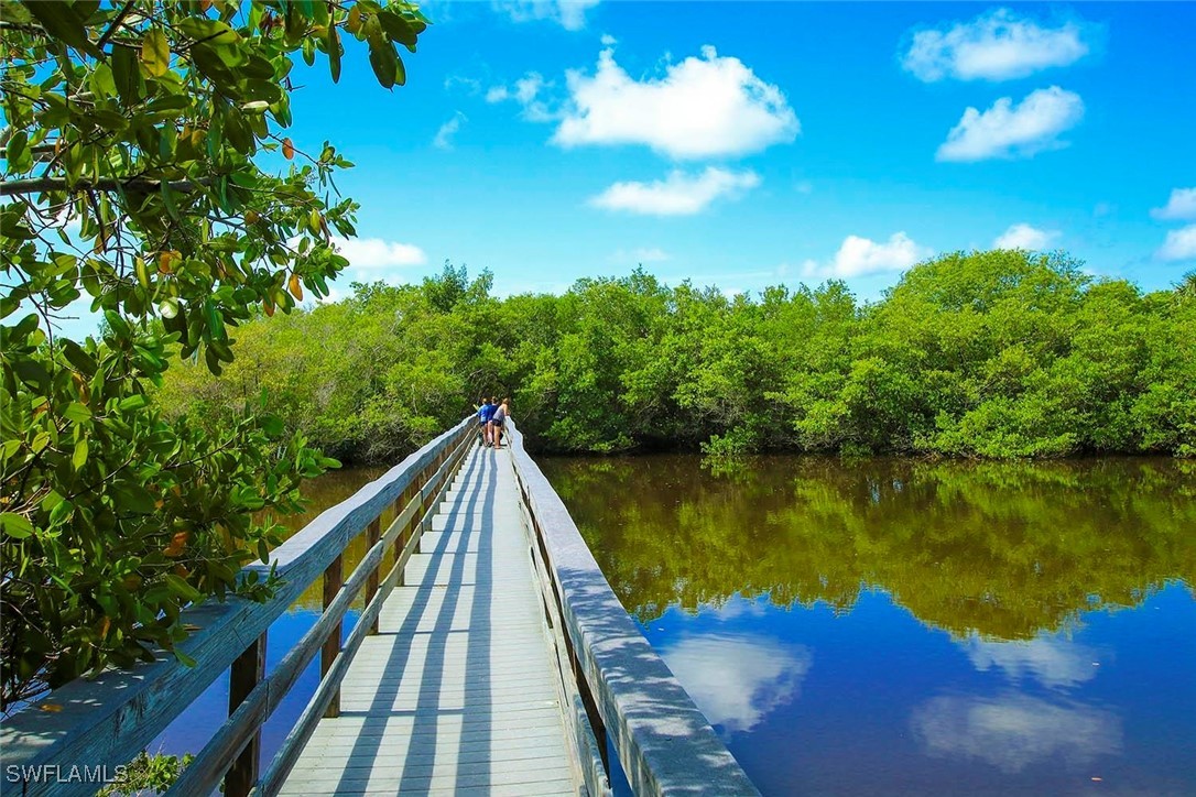 5117 Sea Bell Road, Unit F104 Sanibel, FL 33957 - Photo 31 of 41 a view of swimming pool with a lake view