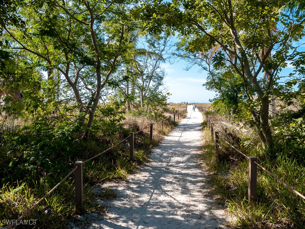 5117 Sea Bell Road, Unit F104 Sanibel, FL 33957 - Photo 33 of 41 a view of a lake with houses