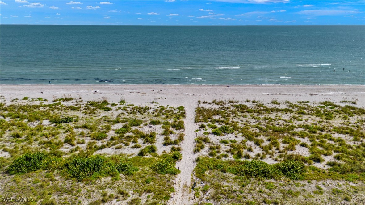 5117 Sea Bell Road, Unit F104 Sanibel, FL 33957 - Photo 37 of 41 a view of beach and ocean