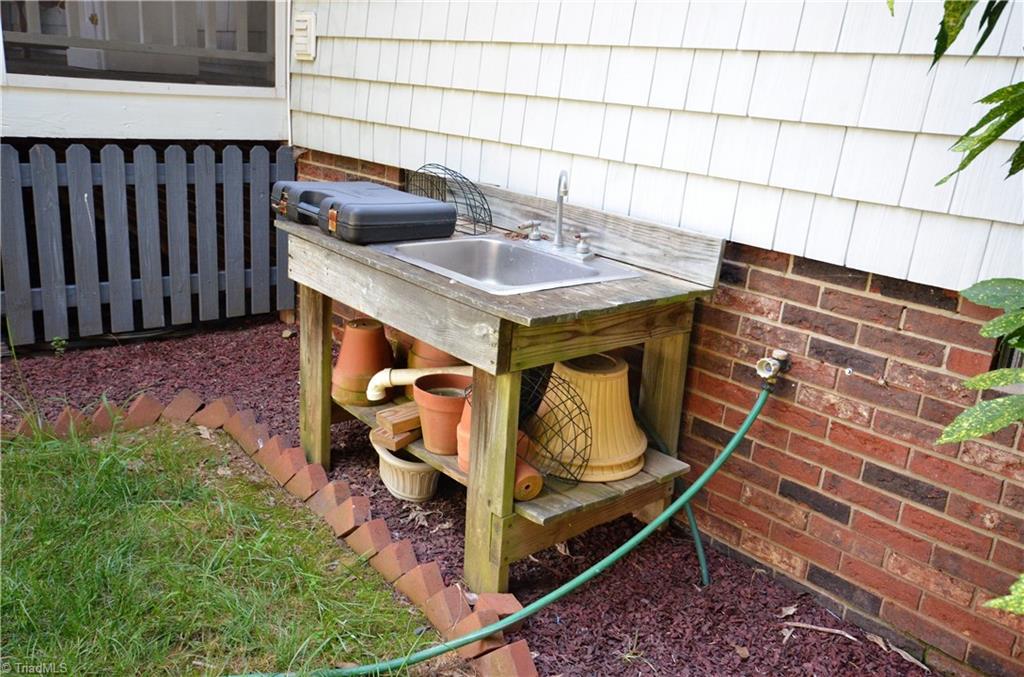 3925 Braddock Road High Point, NC 27265 - Photo 23 of 28 Perfect spot and sink for all your gardening and your pets.