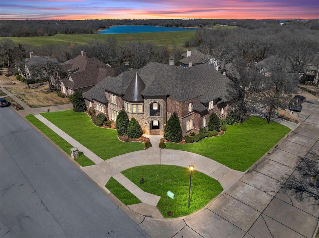 an aerial view of a house with outdoor space
