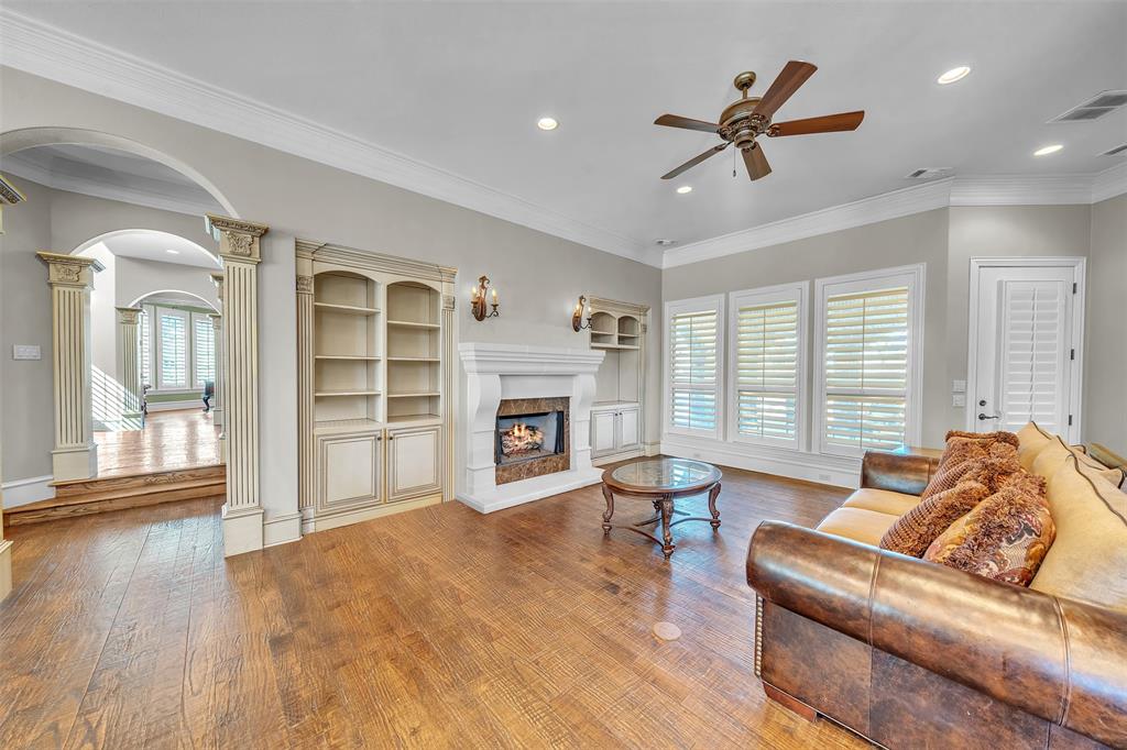2909 Canyon Creek Drive Sherman, TX 75092 - Photo 12 of 40 a living room with furniture and a fireplace