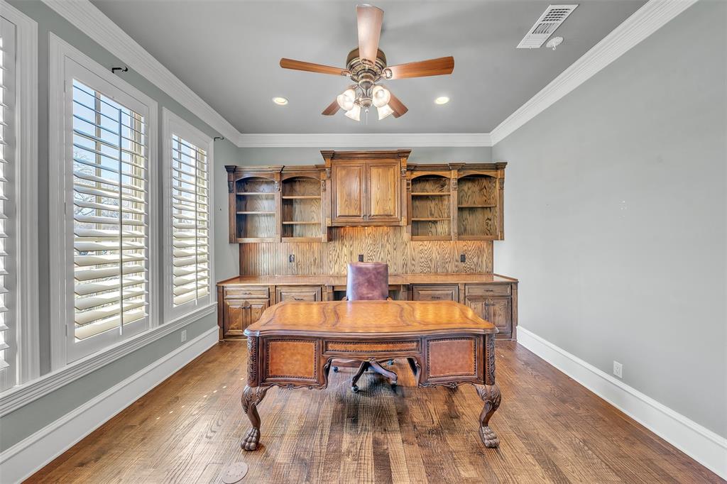 2909 Canyon Creek Drive Sherman, TX 75092 - Photo 14 of 40 a view of a dining room with furniture window and wooden floor