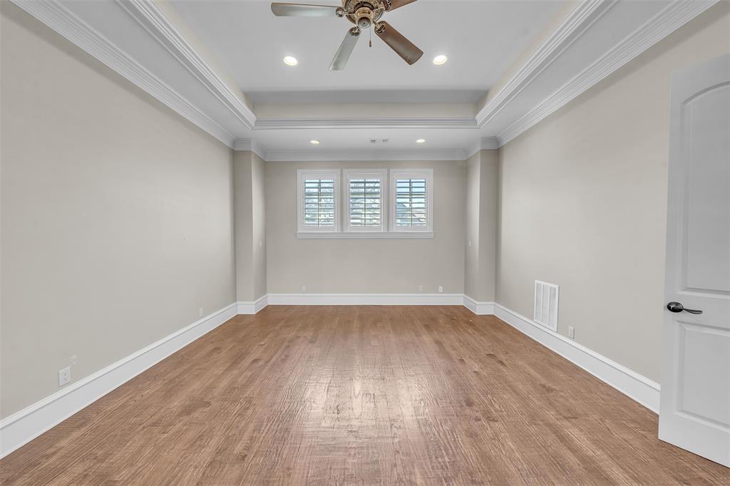 2909 Canyon Creek Drive Sherman, TX 75092 - Photo 15 of 40 wooden floor in an empty room with a window