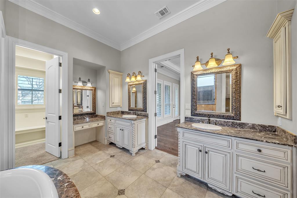 2909 Canyon Creek Drive Sherman, TX 75092 - Photo 18 of 40 a spacious bathroom with a granite countertop tub sink and mirror