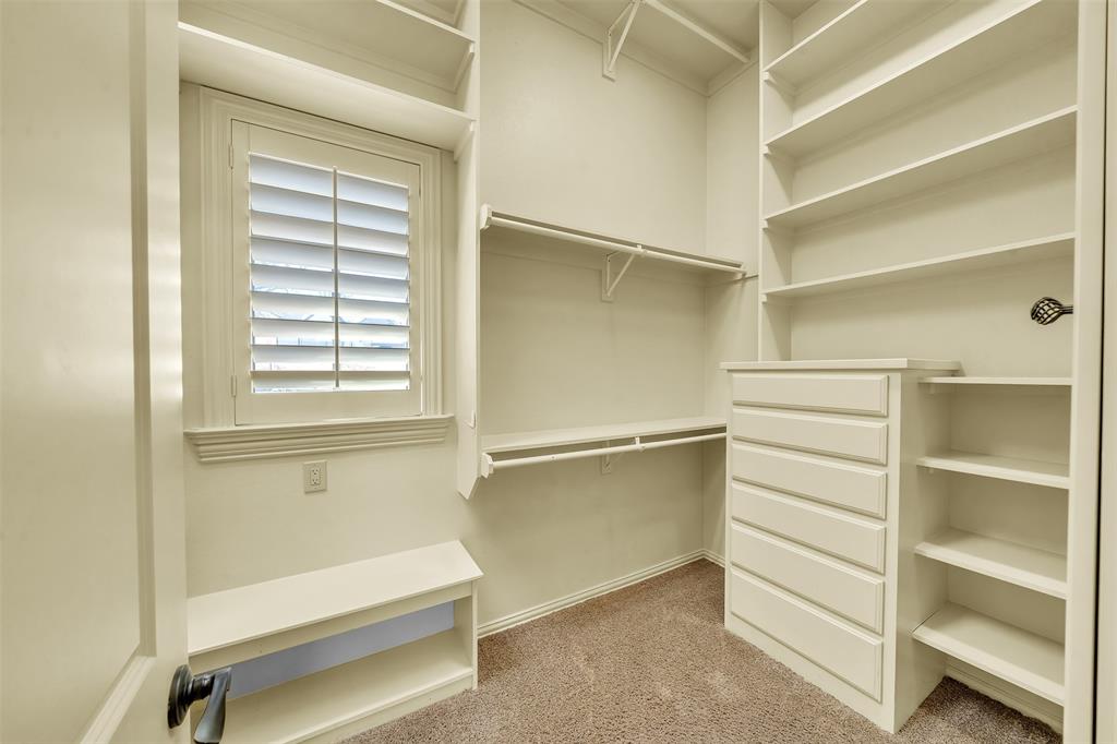 2909 Canyon Creek Drive Sherman, TX 75092 - Photo 21 of 40 a view of walk in closet with empty racks