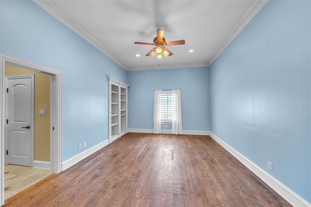2909 Canyon Creek Drive Sherman, TX 75092 - Photo 27 of 40 wooden floor in an empty room with a window