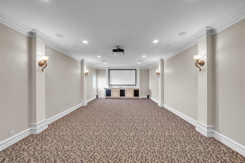 2909 Canyon Creek Drive Sherman, TX 75092 - Photo 30 of 40 a view of a hallway to kitchen and a sink