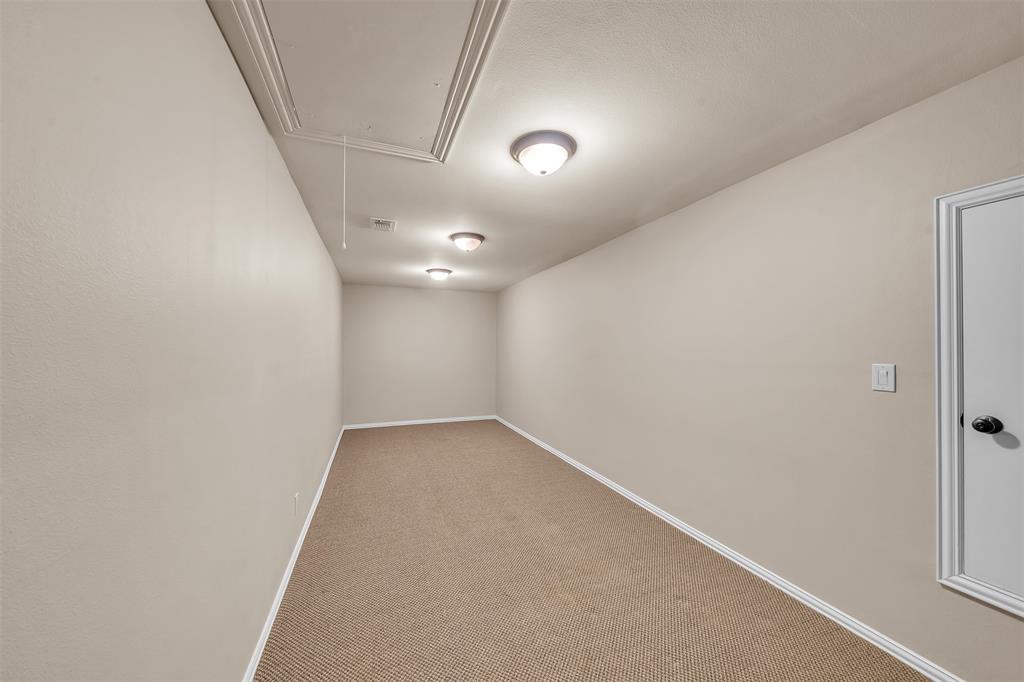 2909 Canyon Creek Drive Sherman, TX 75092 - Photo 33 of 40 an empty room with a empty space and windows