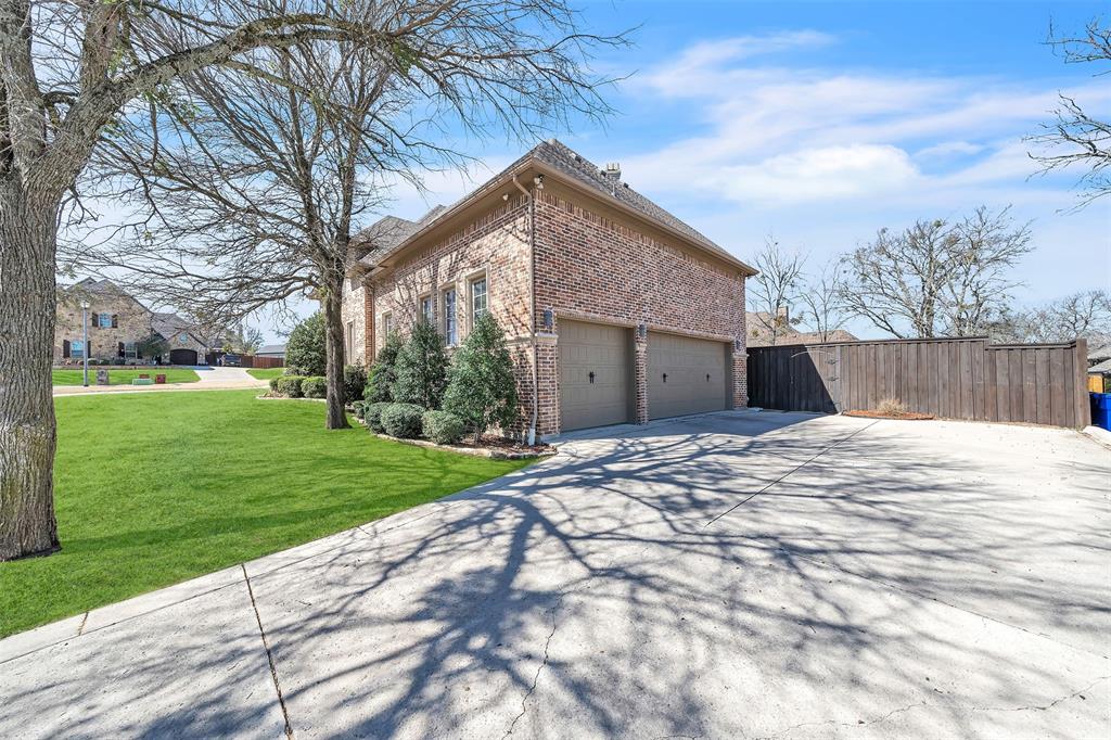 2909 Canyon Creek Drive Sherman, TX 75092 - Photo 38 of 40 a front view of house with yard and green space