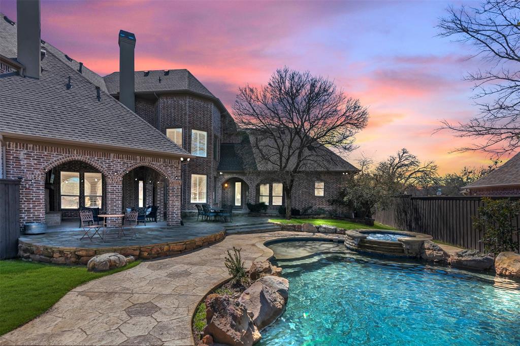 2909 Canyon Creek Drive Sherman, TX 75092 - Photo 4 of 40 a front view of a house with garden