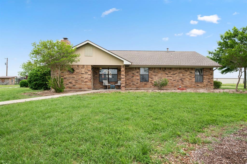 2752 South Branch Road Krum, TX 76249 - Photo 3 of 33 a front view of a house with garden