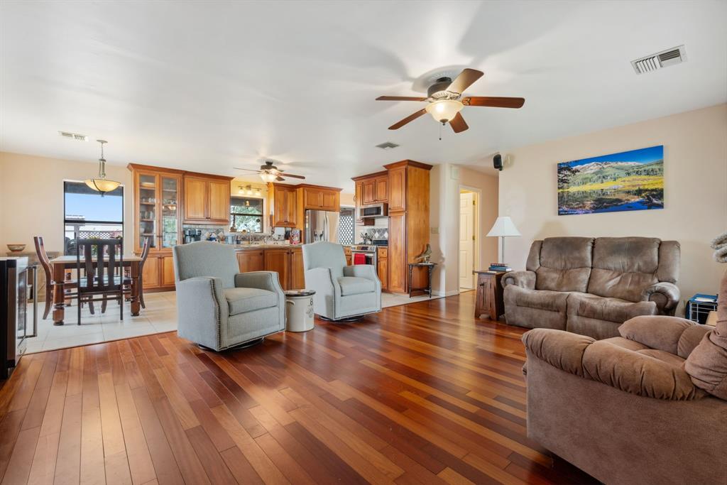 2752 South Branch Road Krum, TX 76249 - Photo 6 of 33 a living room with furniture and a large window