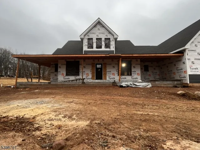 a front view of a house with a porch
