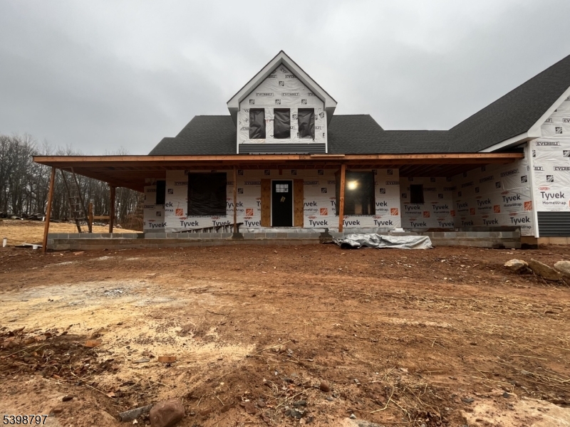 108 Highland Lakes Road Highland Lakes, NJ 07422 - Photo 4 of 21 a front view of a house with a porch