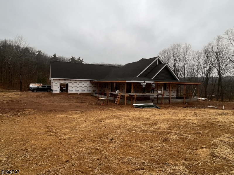 108 Highland Lakes Road Highland Lakes, NJ 07422 - Photo 7 of 21 a front view of a house with wooden fence