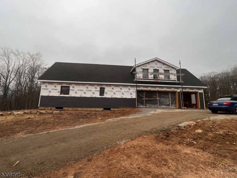 108 Highland Lakes Road Highland Lakes, NJ 07422 - Photo 10 of 21 a view of a house with a roof deck