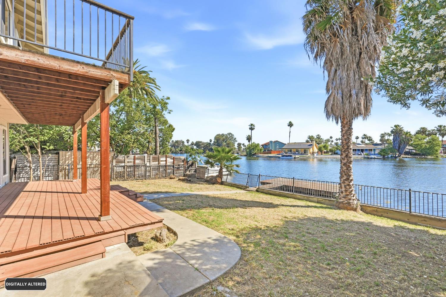 5501 Riverlake Road Discovery Bay, CA 94505 - Photo 3 of 60 a view of a backyard patio and swimming pool