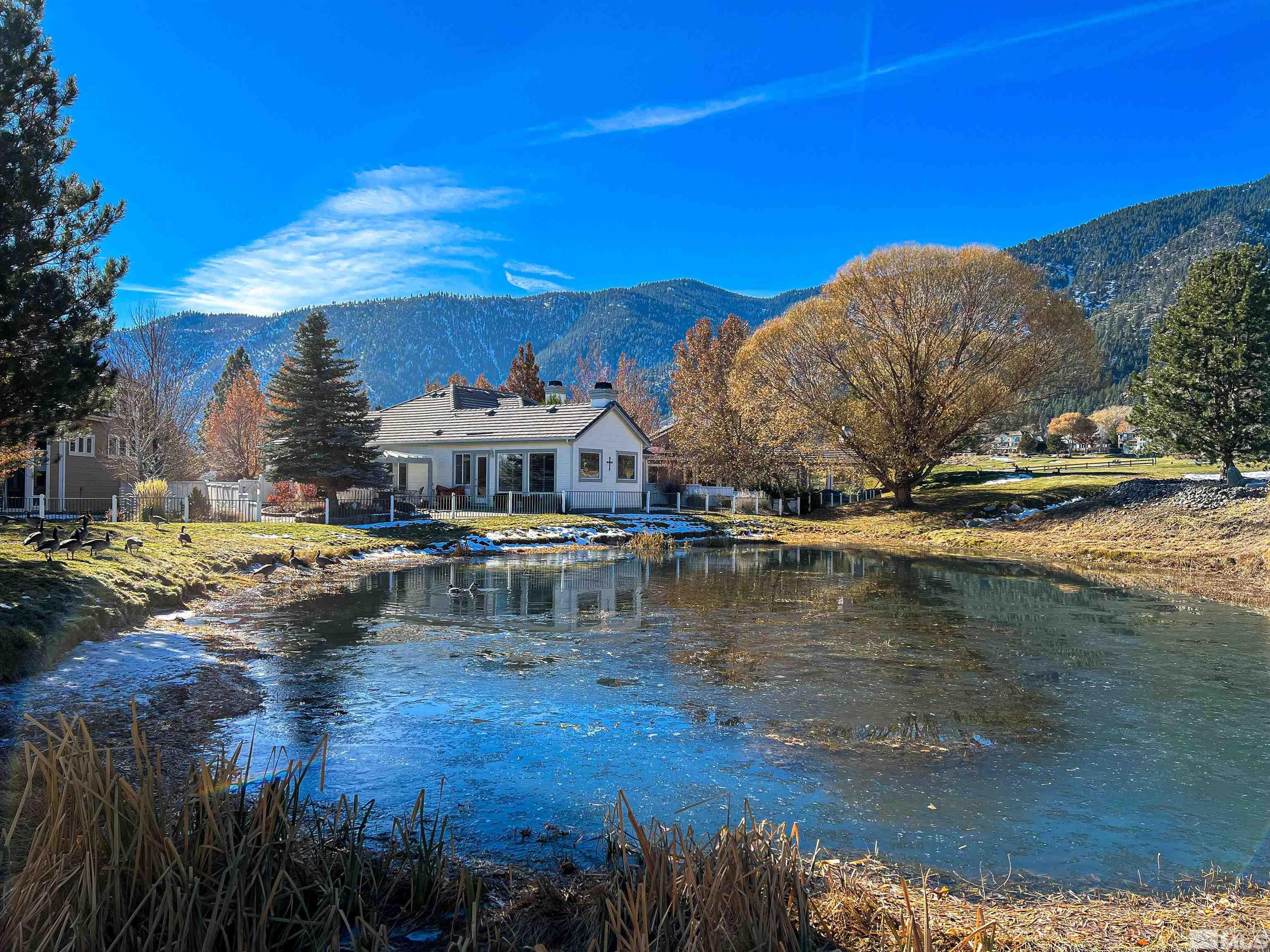 a view of a lake with houses