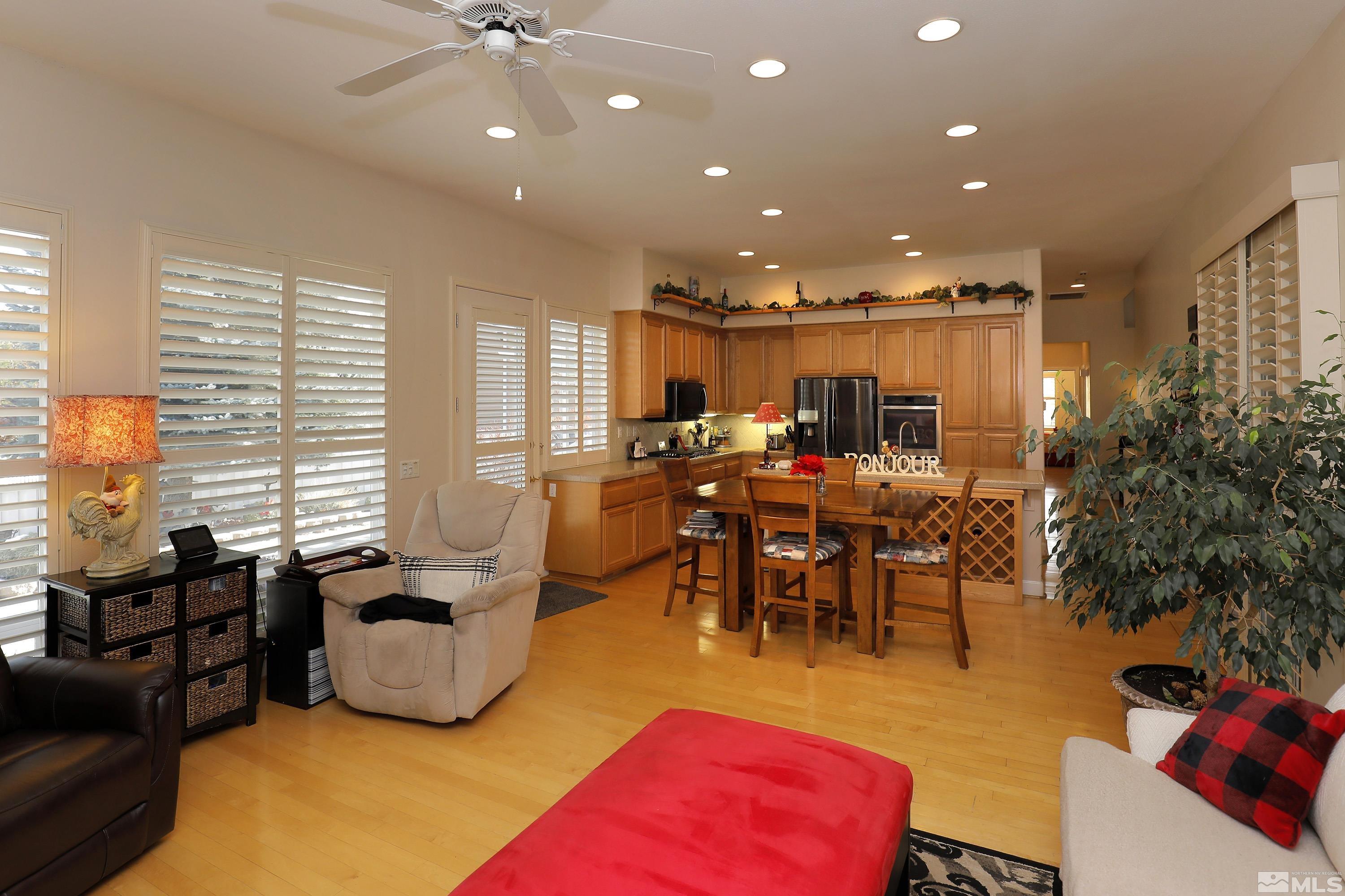2461 Genoa Genoa, NV 89411 - Photo 14 of 35 a living room with furniture and a large window