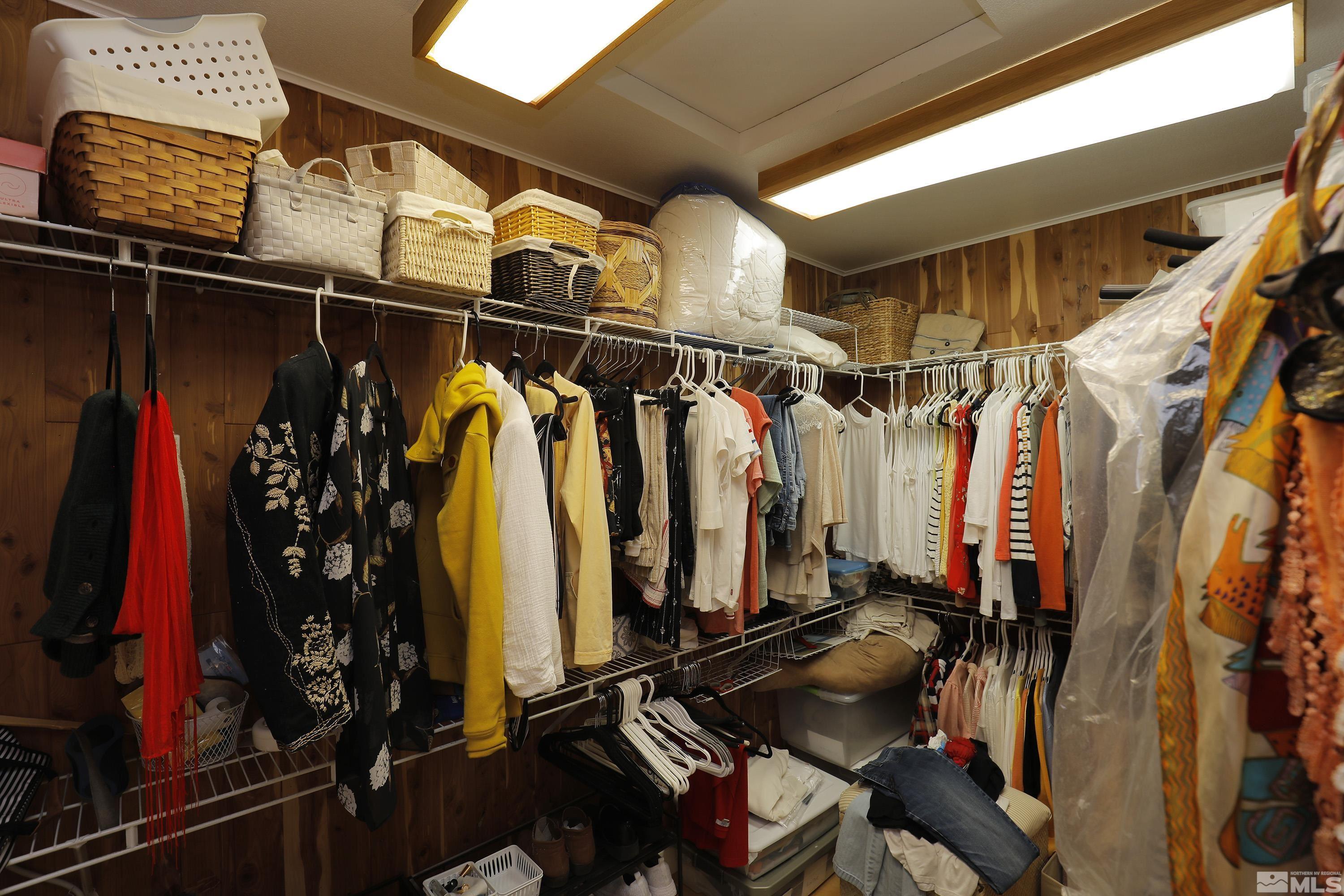2461 Genoa Genoa, NV 89411 - Photo 23 of 35 a view of walk in closet with clothes and shoes
