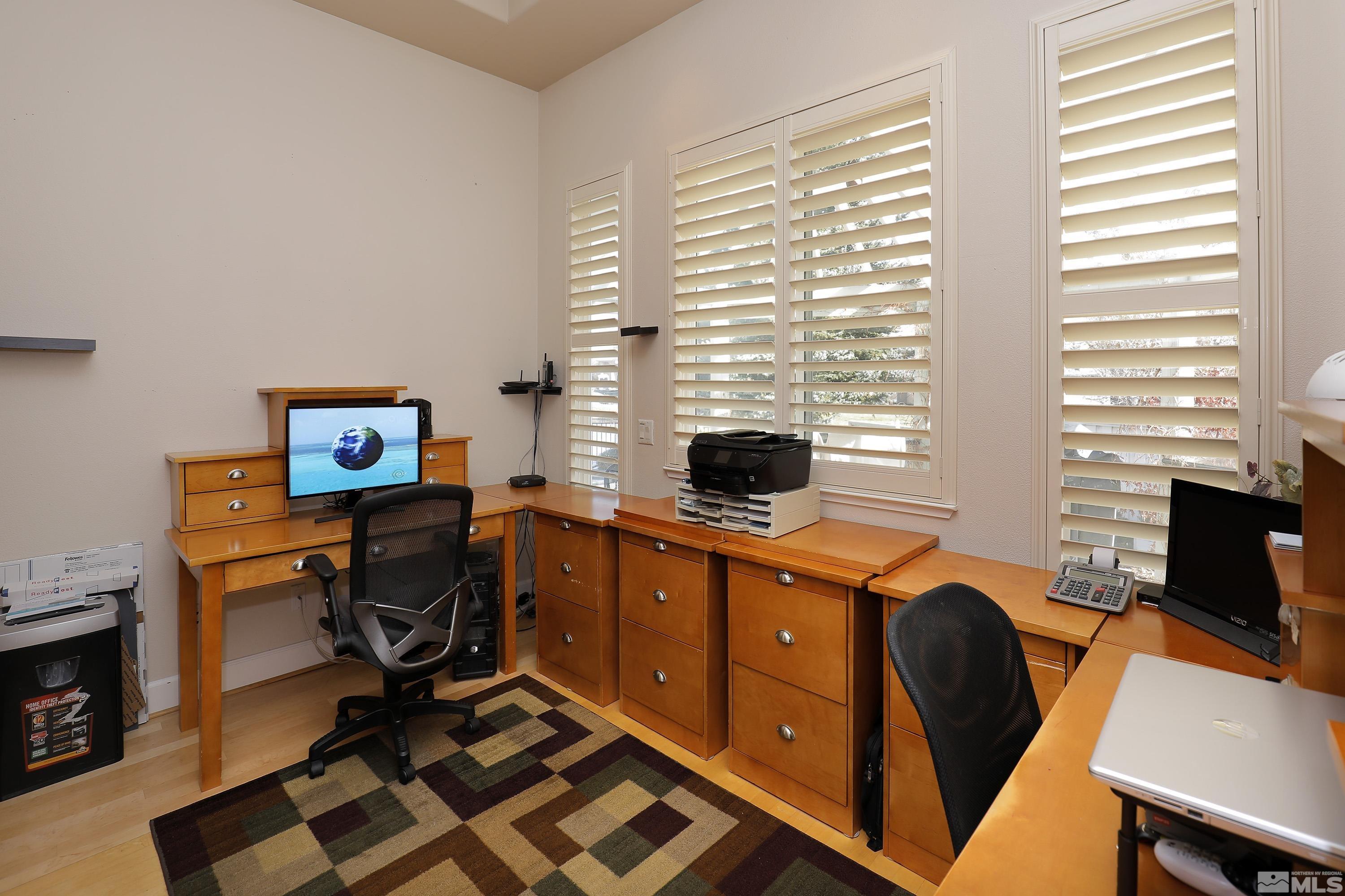 2461 Genoa Genoa, NV 89411 - Photo 29 of 35 a view of a workspace with furniture and a window