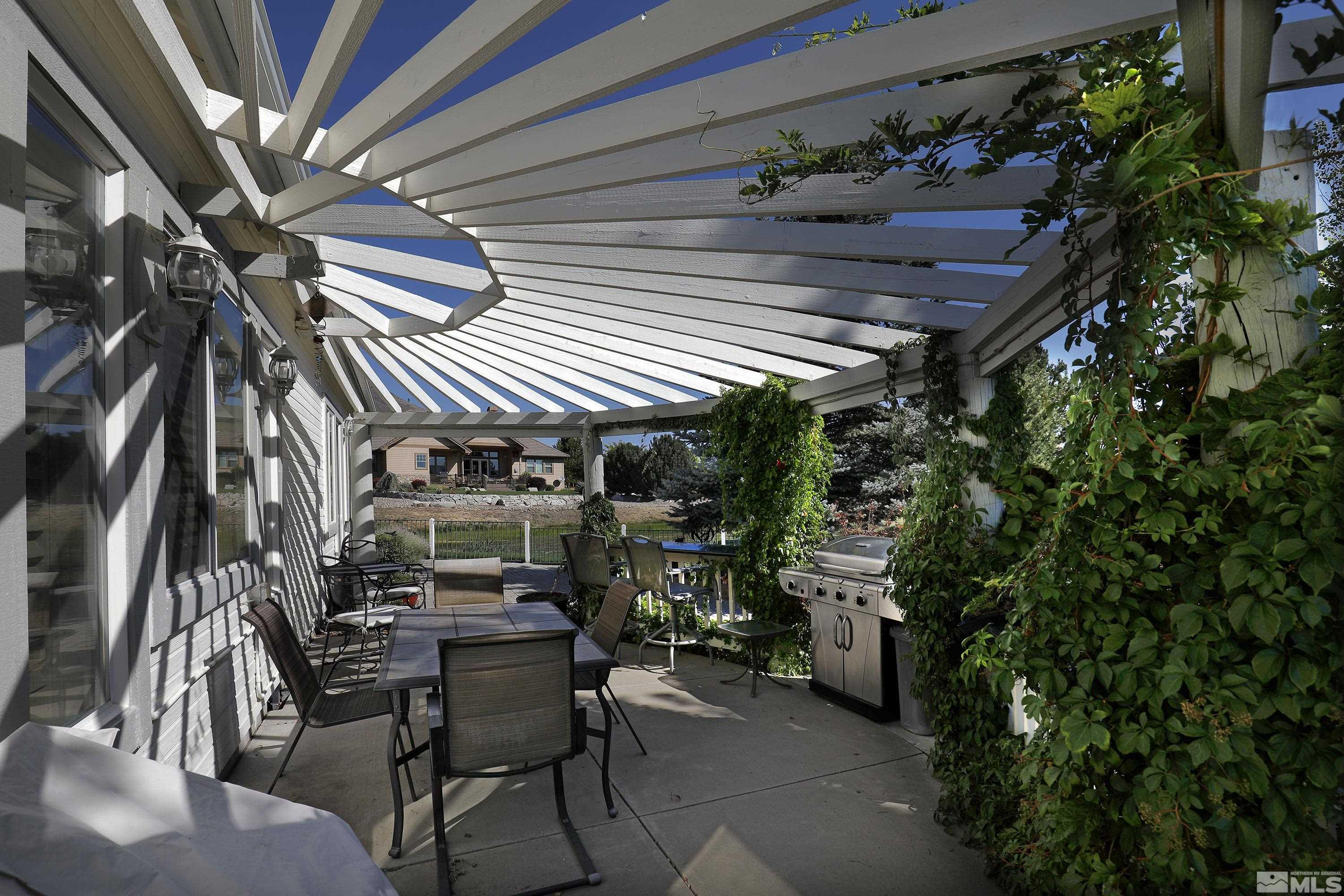 2461 Genoa Genoa, NV 89411 - Photo 31 of 35 a view of a chairs and table in a patio