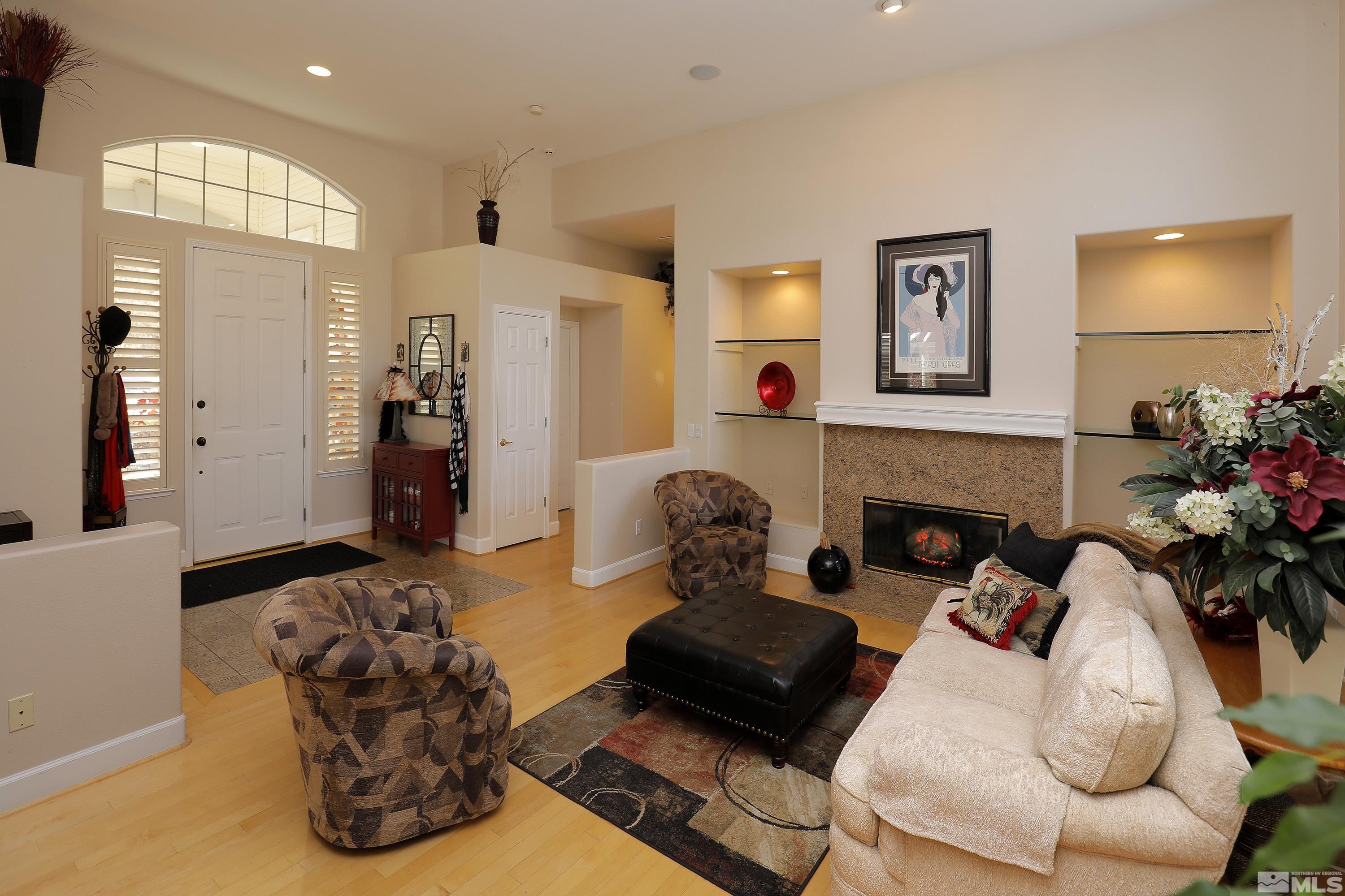 2461 Genoa Genoa, NV 89411 - Photo 4 of 35 a living room with furniture and a fireplace
