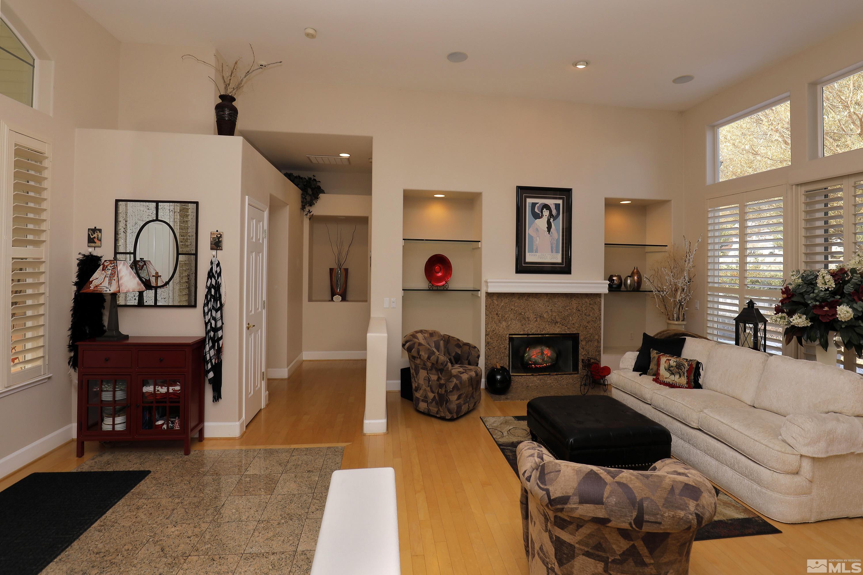 2461 Genoa Genoa, NV 89411 - Photo 6 of 35 a living room with furniture and a fireplace