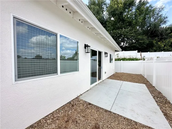 a house view with a outdoor space