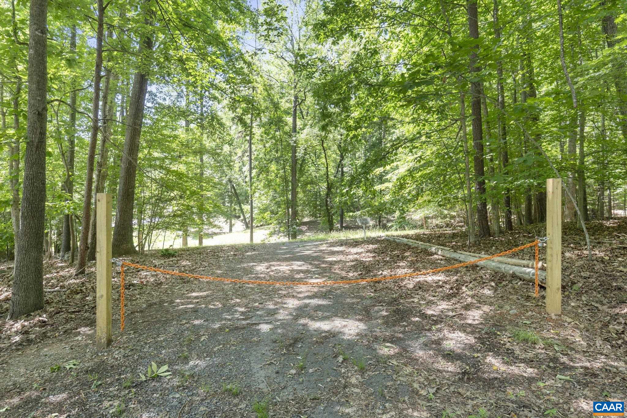 2 Whippoorwill Lane Palmyra, VA 22963 - Photo 31 of 36 a view of a yard with plants and trees
