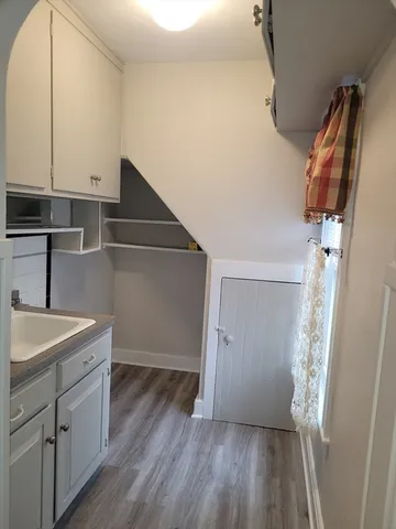 a view of a kitchen from a ceiling fan