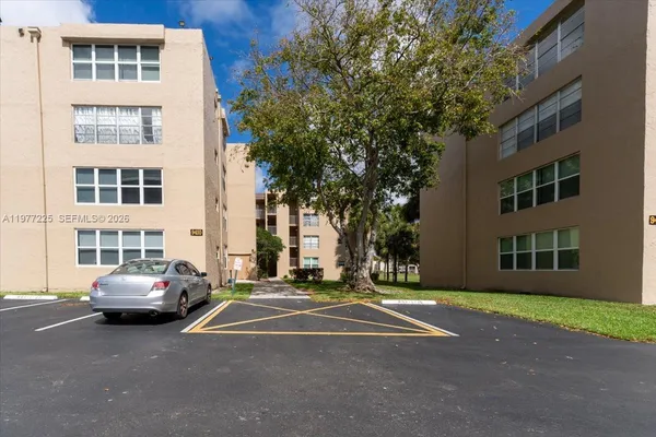 a cars parked in front of a building
